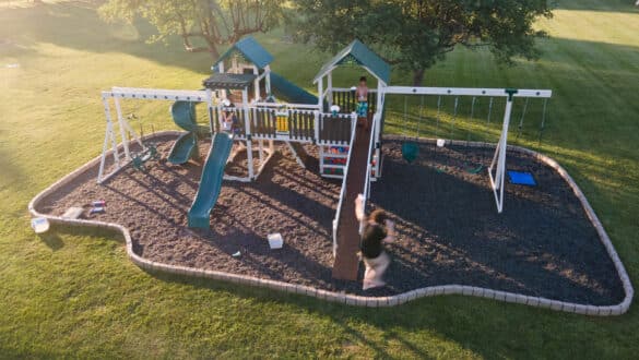 Mulch beds add a lot of value to a swing set: what type is right for your family?