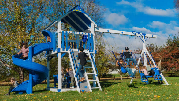 This image shows a blue and ivory swing set