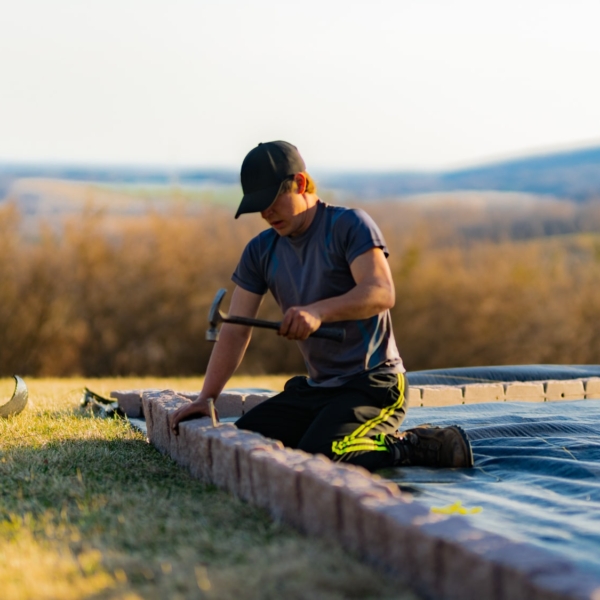 One of King Swing's install crews is installing Beuta Landscape Blocks.